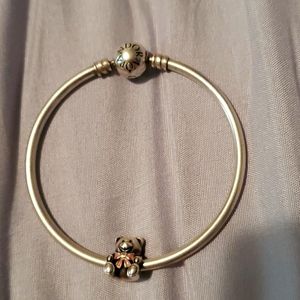 Pandora bangle with bear charm.